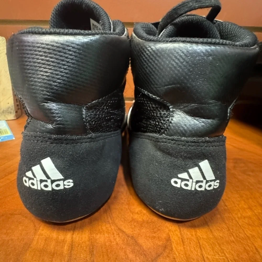 Adidas Black and White High-Top Athletic Shoes